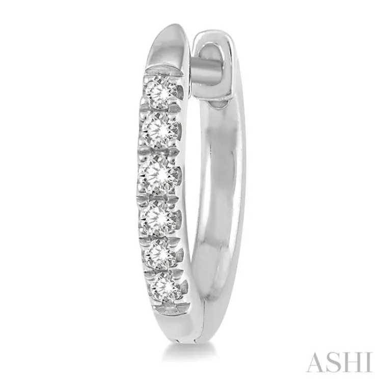 1/8 ctw Round Cut Diamond Huggie Petite Earrings in 14K White Gold