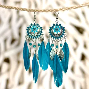 Bohemian-style dreamcatcher vibrant turquoise feathers earrings