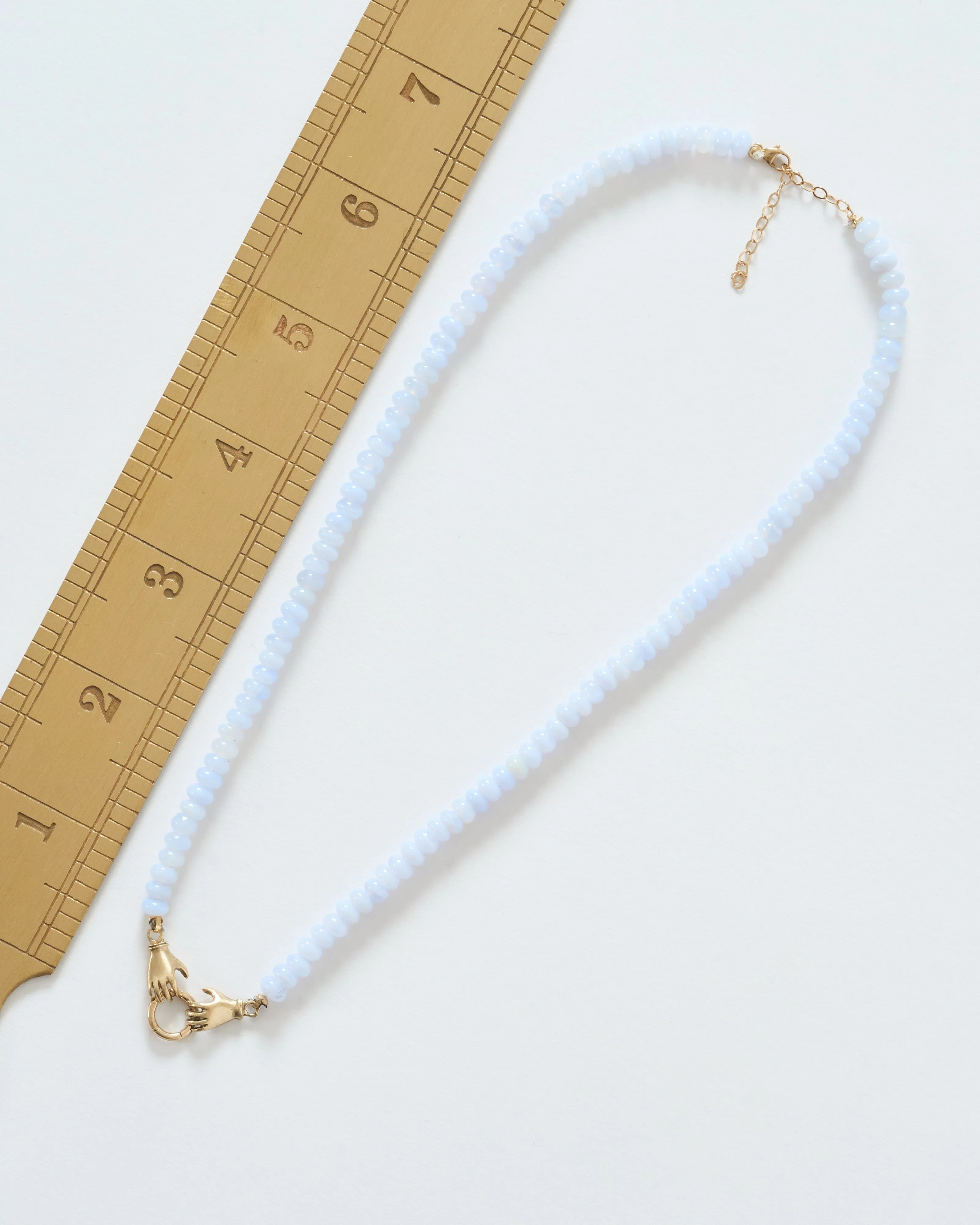 double hand charm holder necklace - gold/blue