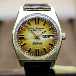 JULES JURGENSEN Swiss Automatic Wristwatch Caliber Int. 7523 25J Day/Date Watch
