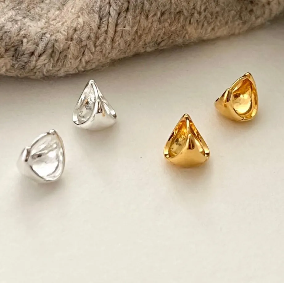 Mini Oval Huggie Earrings in 18K Gold and Sterling Silver