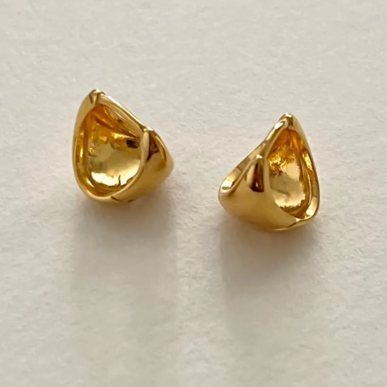 Mini Oval Huggie Earrings in 18K Gold and Sterling Silver