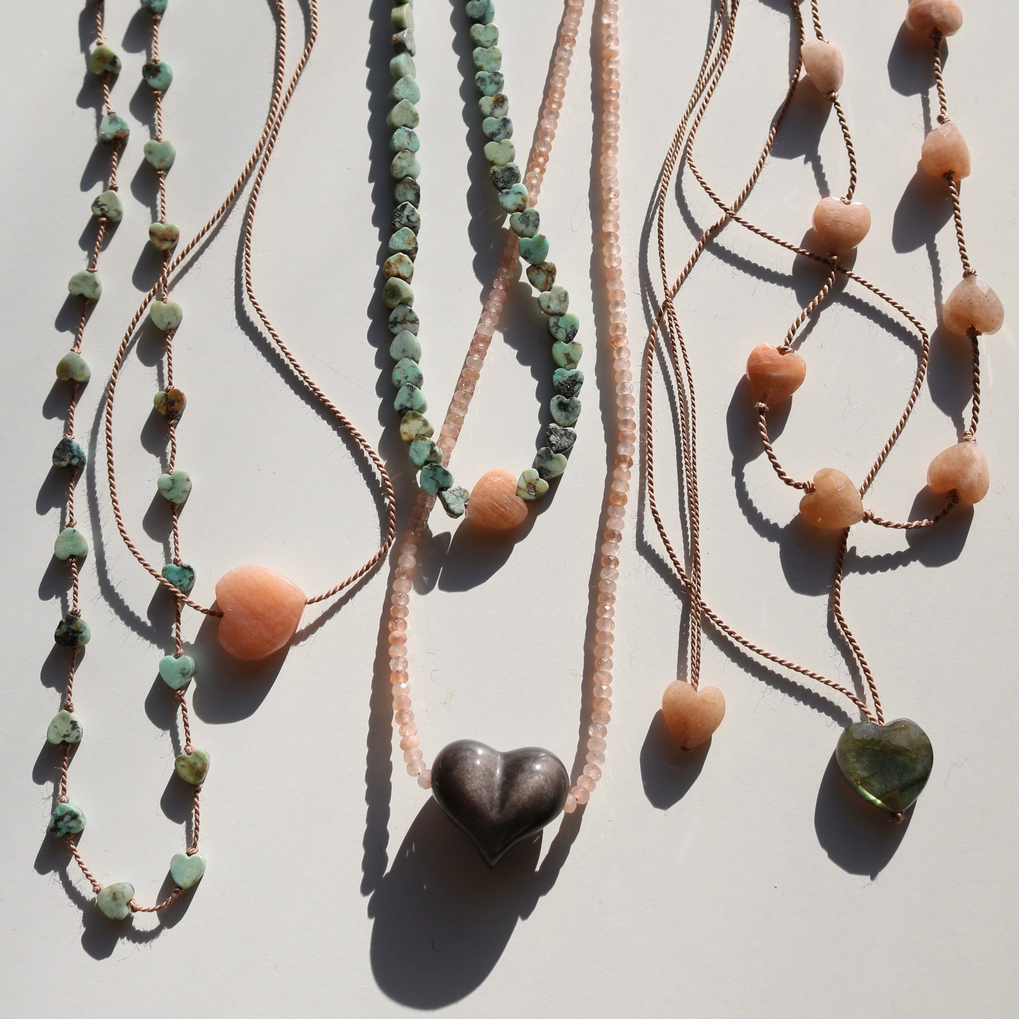 SILVER SHEEN OBSIDIAN HEART   PEACH MOONSTONE OM NECKLACE