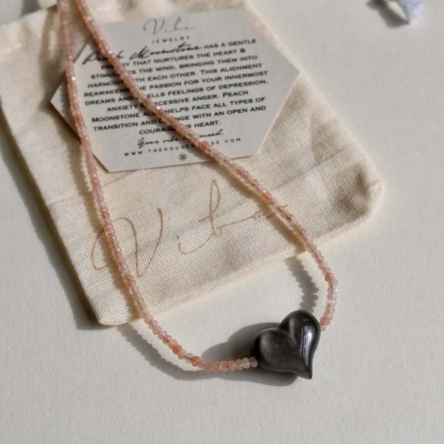SILVER SHEEN OBSIDIAN HEART   PEACH MOONSTONE OM NECKLACE