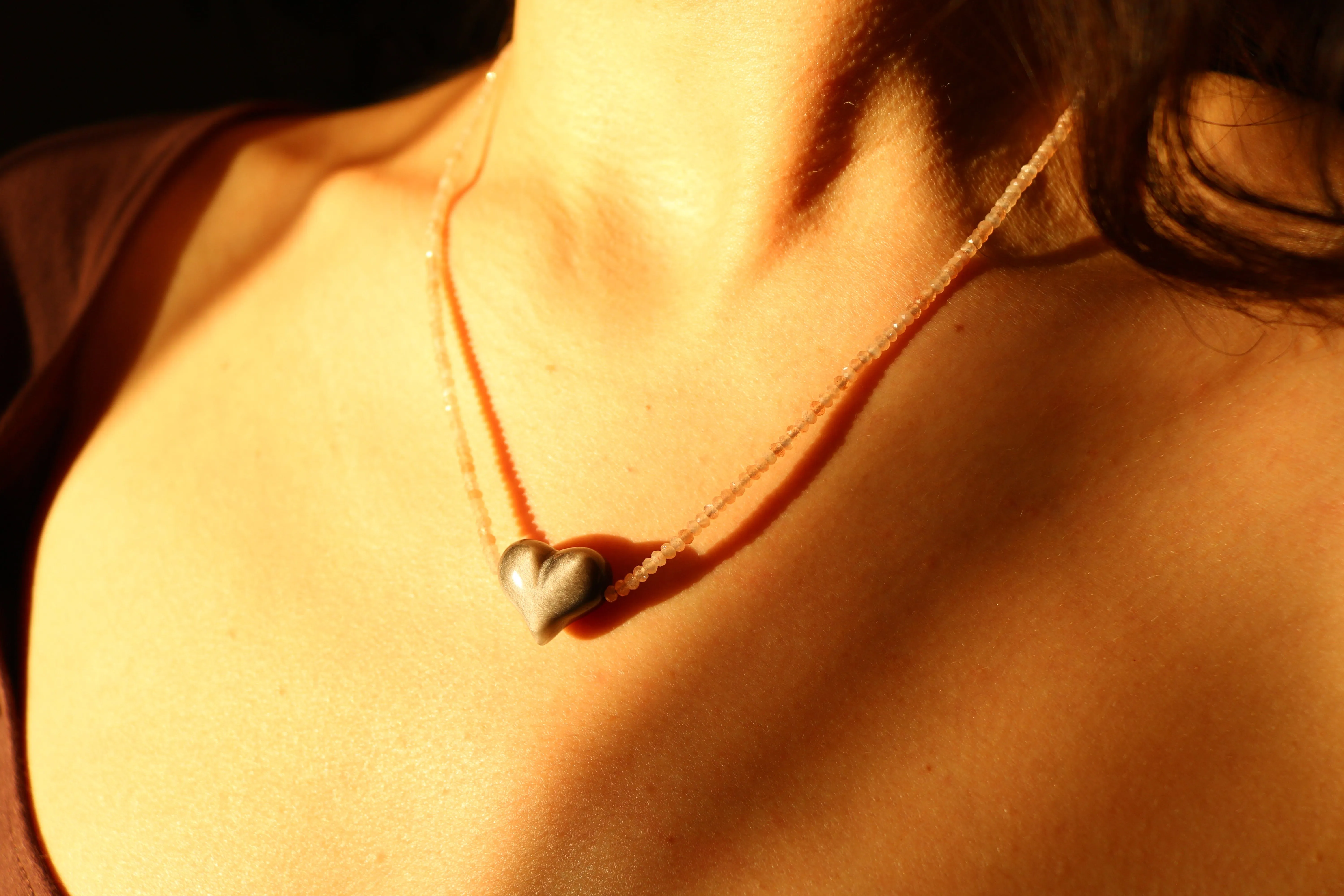 SILVER SHEEN OBSIDIAN HEART   PEACH MOONSTONE OM NECKLACE