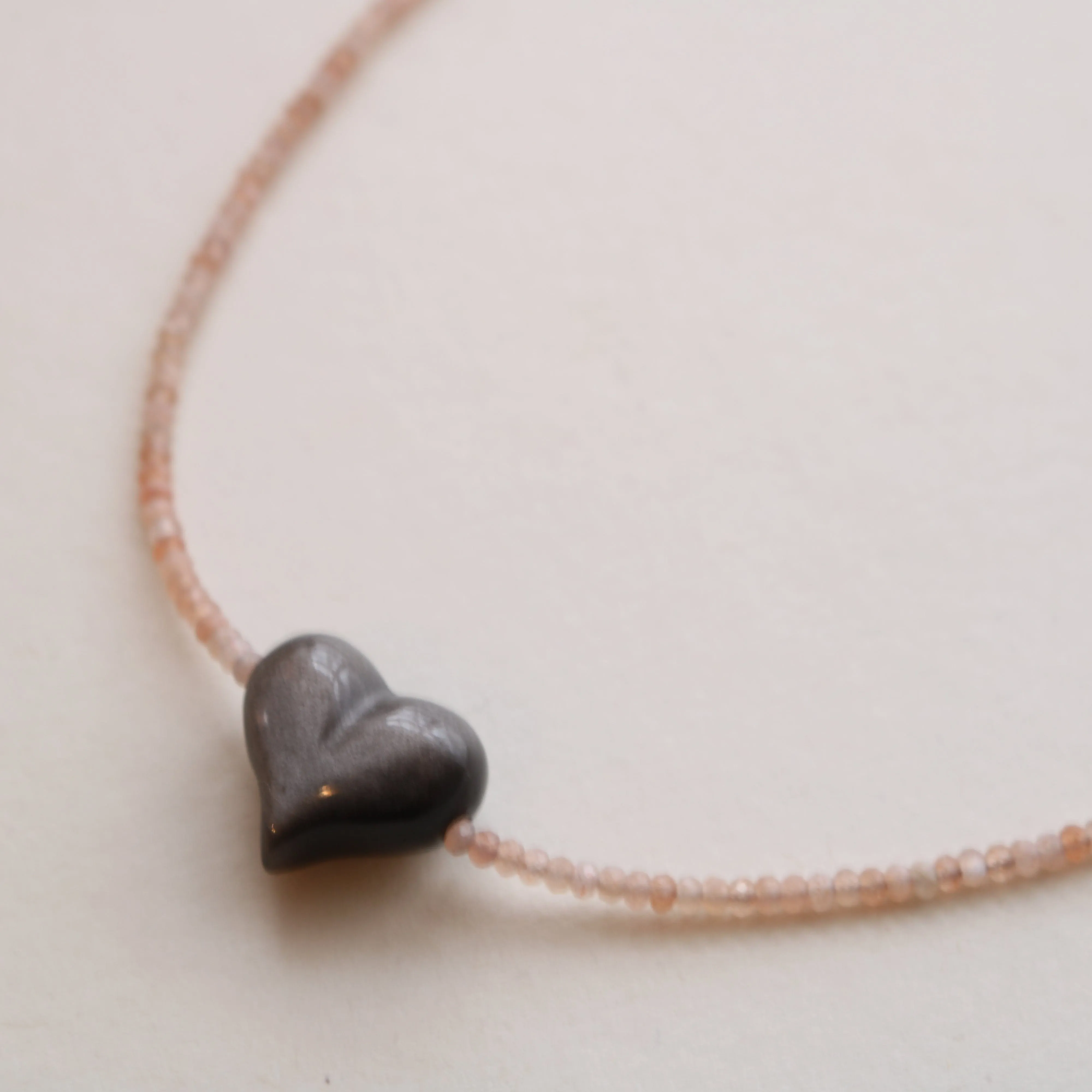 SILVER SHEEN OBSIDIAN HEART   PEACH MOONSTONE OM NECKLACE