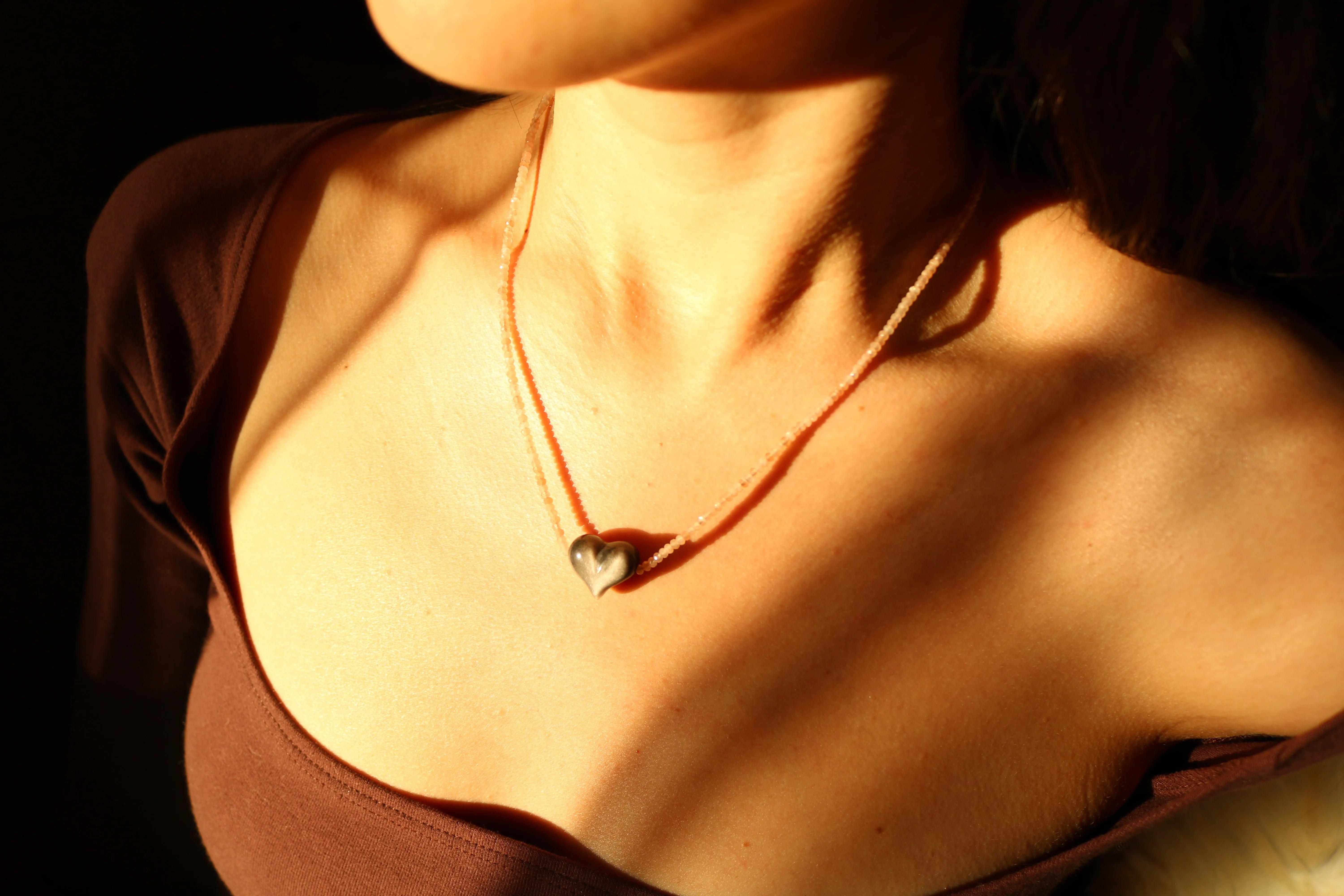 SILVER SHEEN OBSIDIAN HEART   PEACH MOONSTONE OM NECKLACE