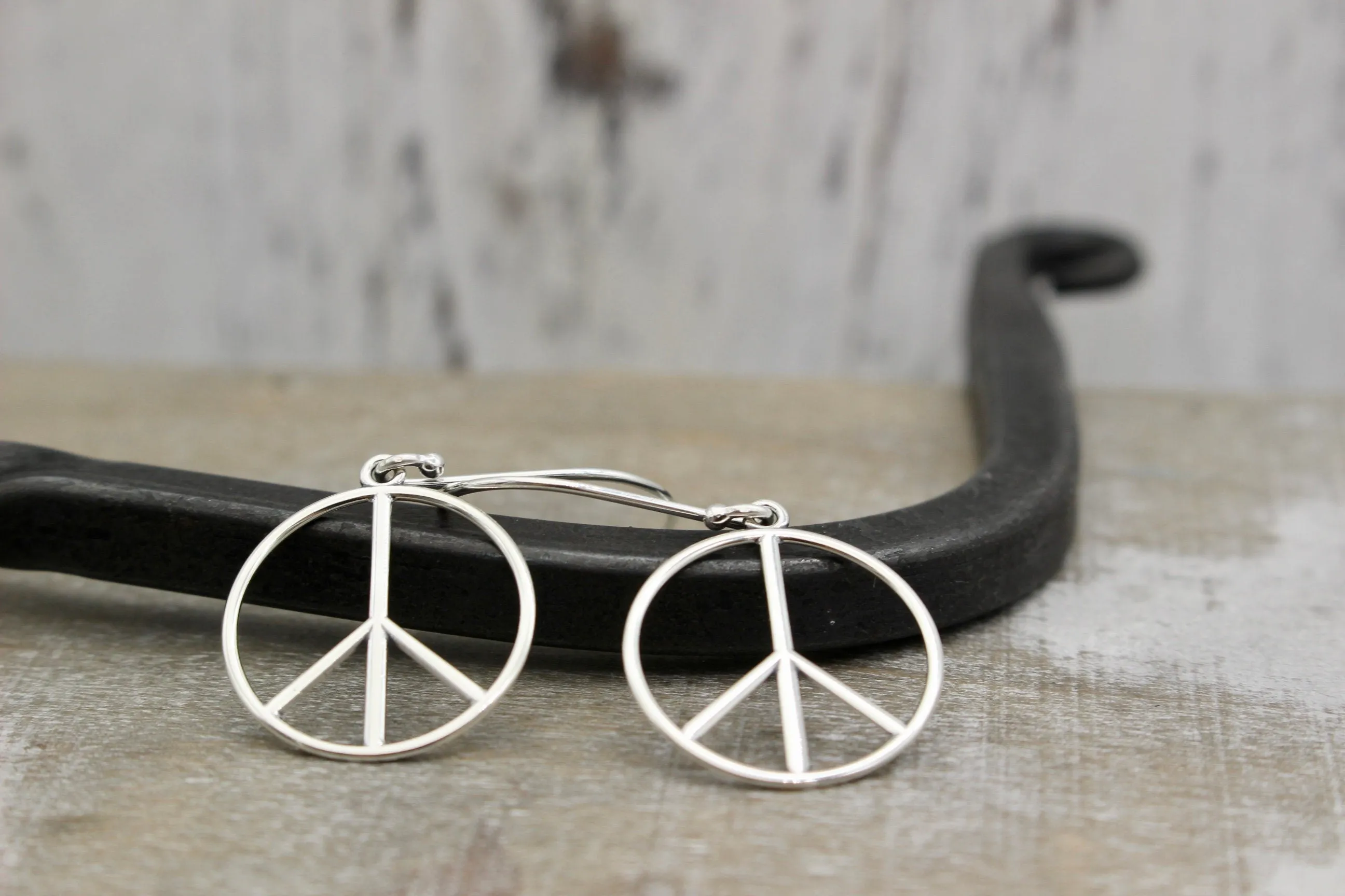 Sterling silver peace earrings